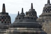 Obrázky ke stránce cestopis Indonésie, Java: chrám Borobudur, socha uvnitř stupy